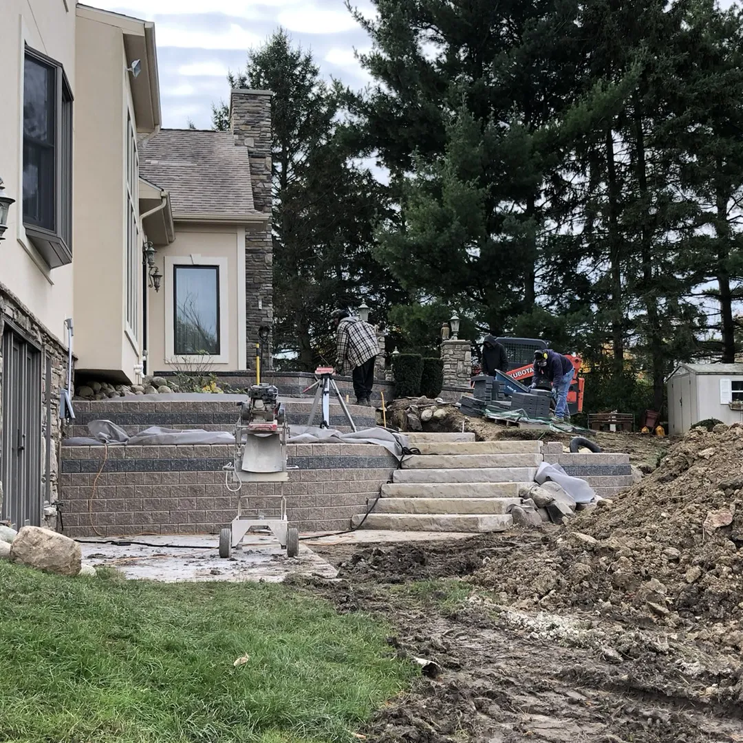 retaining wall steps to patio construction